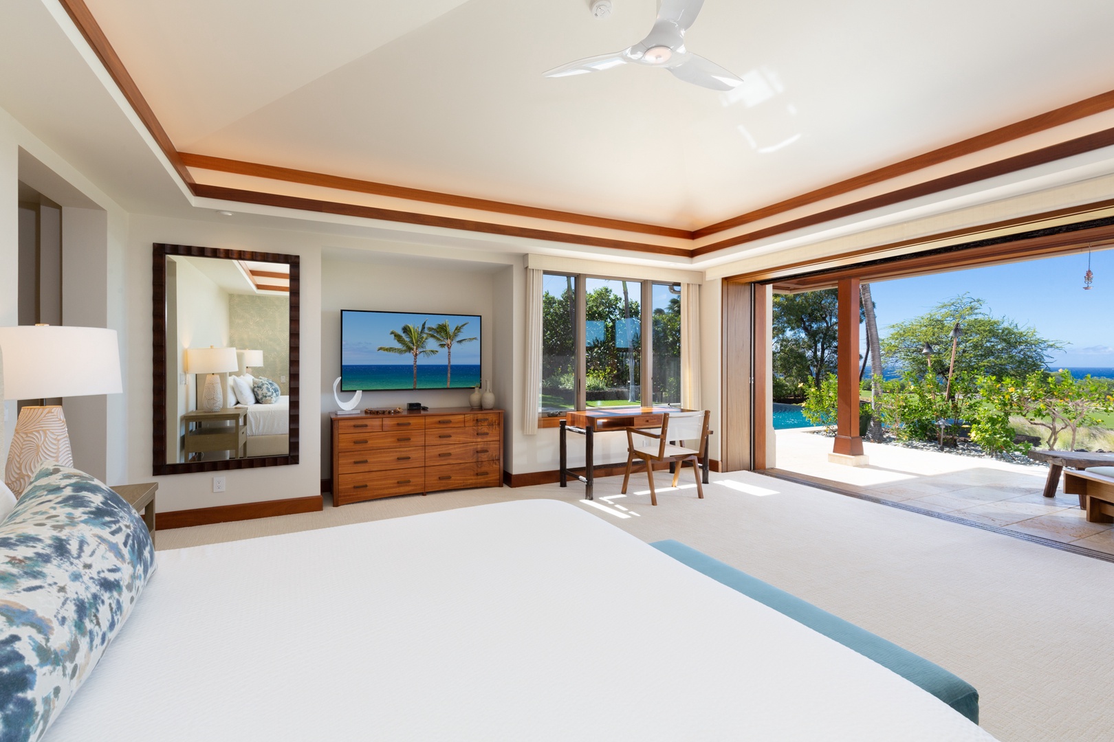 Kailua Kona Vacation Rentals, 4BD Hainoa Estate (102) at Four Seasons Resort at Hualalai - Primary bedroom suite with a king bed, smart TV, walk-in closet, distinct lanai, & en suite bath