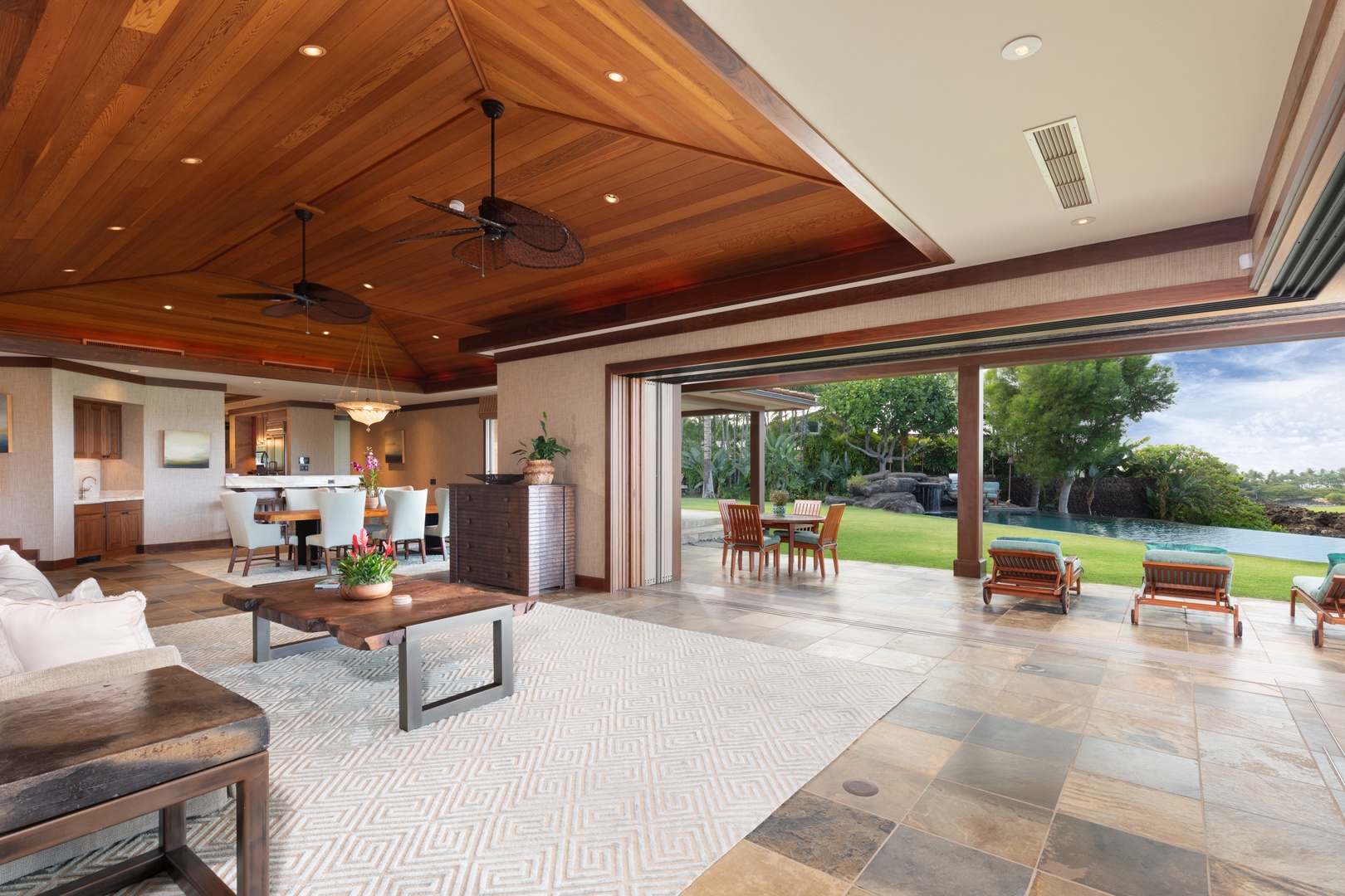 Kailua Kona Vacation Rentals, 5BD Ke Alaula Estate (144) at Hualalai Resort - Open-concept great room flows effortlessly to outdoor lounge and poolside seating.