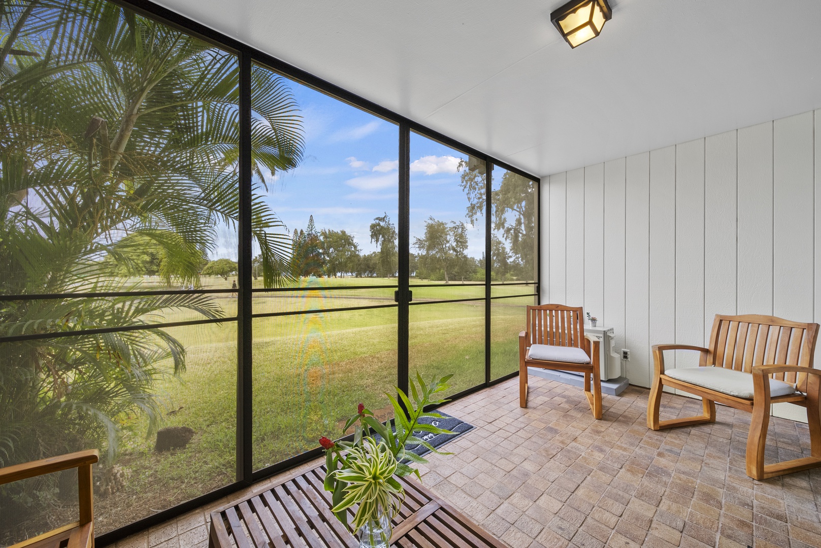 Kahuku Vacation Rentals, Kuilima Estates West #85 - Extra sitting area to have your morning coffee and enjoy the golf course views.