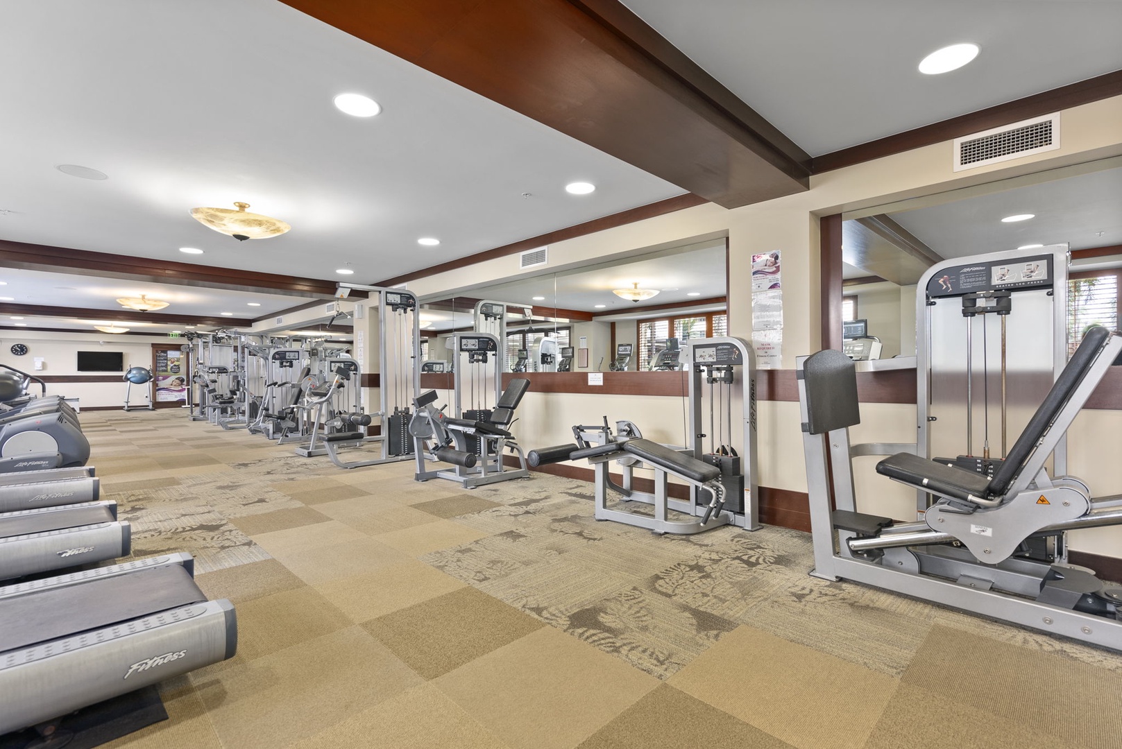 Kapolei Vacation Rentals, Ko Olina Beach Villas B604 - Stay active during your getaway at this well-equipped fitness center, featuring modern cardio machines and strength training equipment for your daily workout routine.