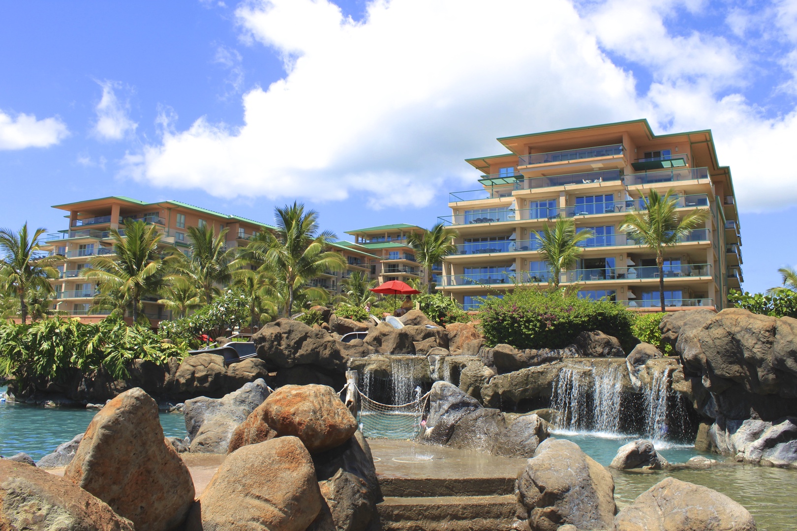 Lahaina Vacation Rentals, Honua Kai Hokulani 214 - Experience the tranquility of cascading waterfalls amidst lush tropical surroundings, just steps away from your luxurious accommodations.