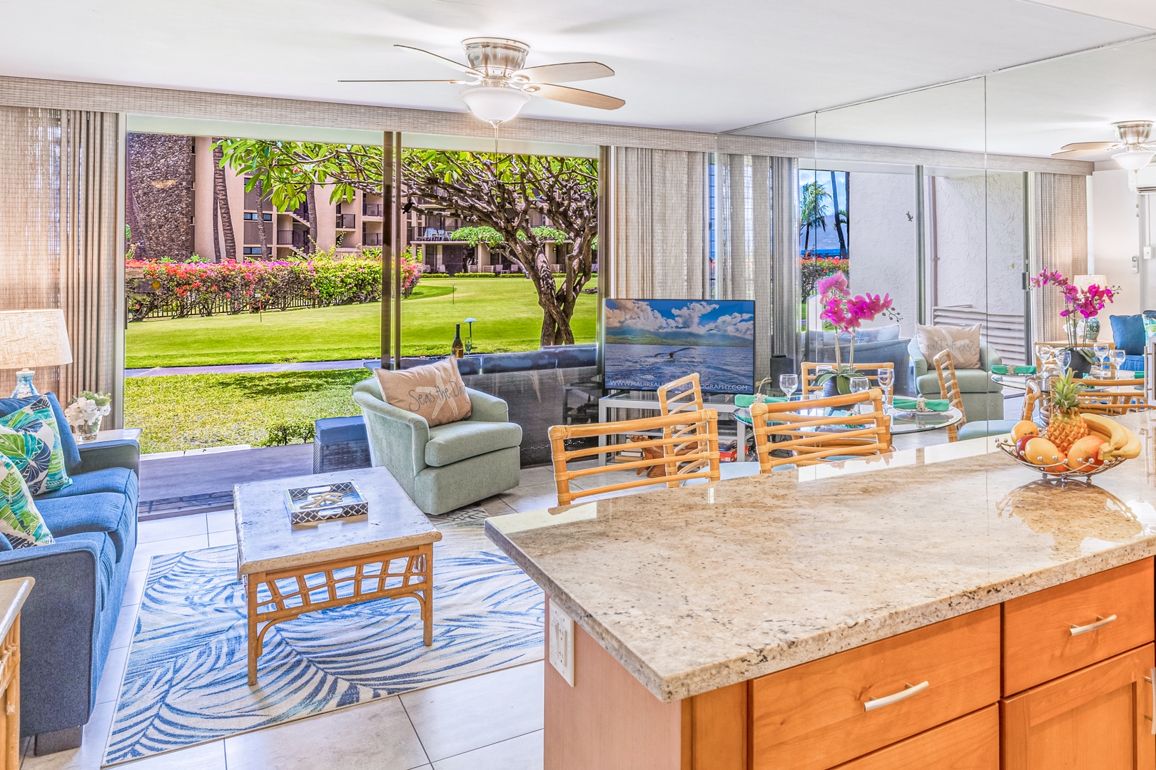 Lahaina Vacation Rentals, Papakea K-105 - The open kitchen connects to the living and dining areas, allowing you to enjoy garden views and natural light while preparing meals