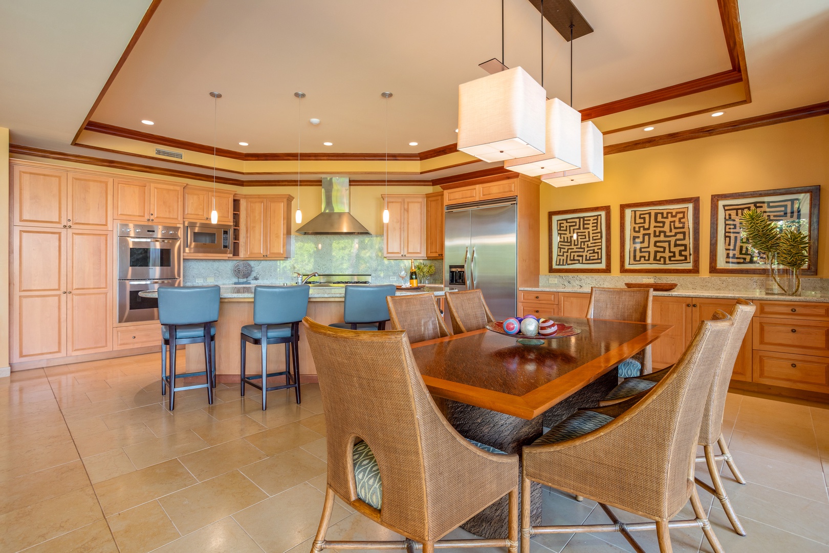 Kamuela Vacation Rentals, Kaunaoa 7B at Mauna Kea Resort - Gourmet Kitchen overlooks Dining Room with seating for the whole family