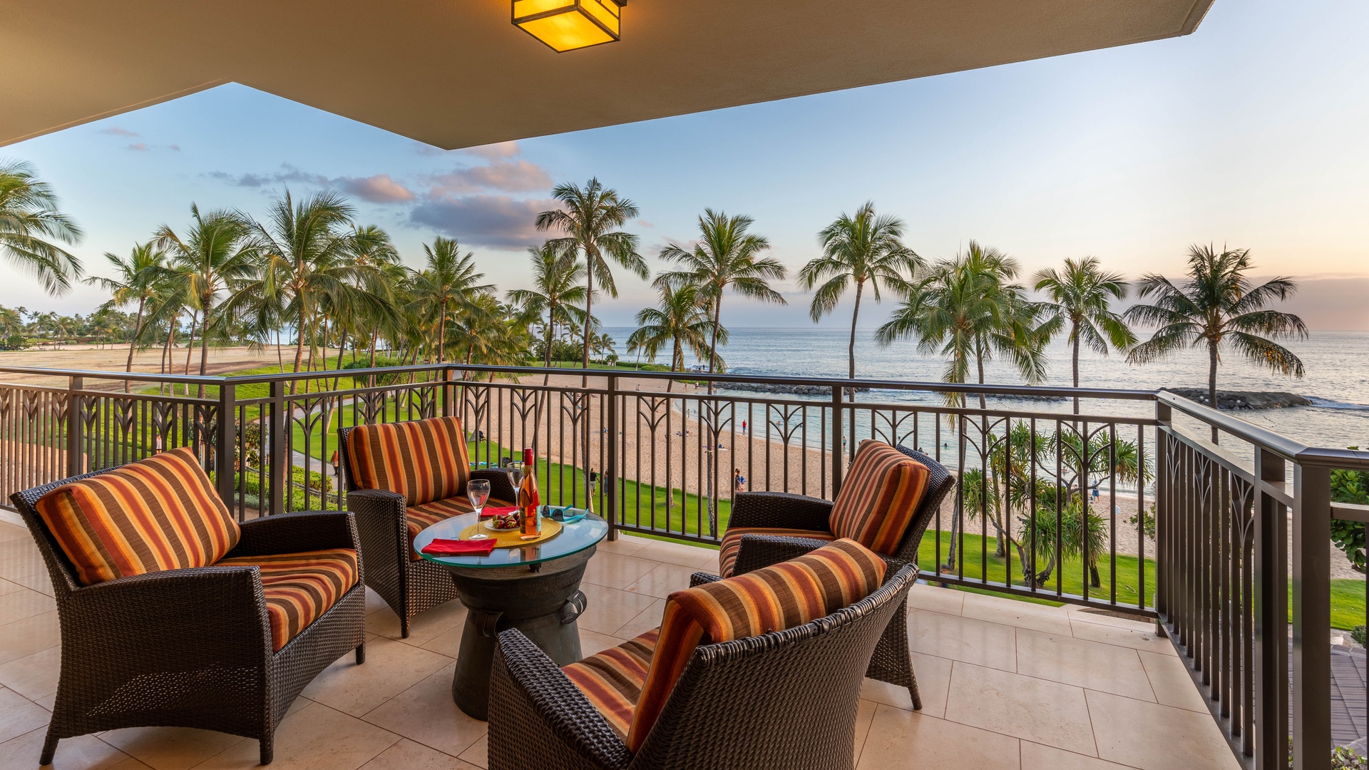 Kapolei Vacation Rentals, Ko Olina Beach Villas B310 - Indoor / outdoor entertaining surrounded by swaying palm trees.