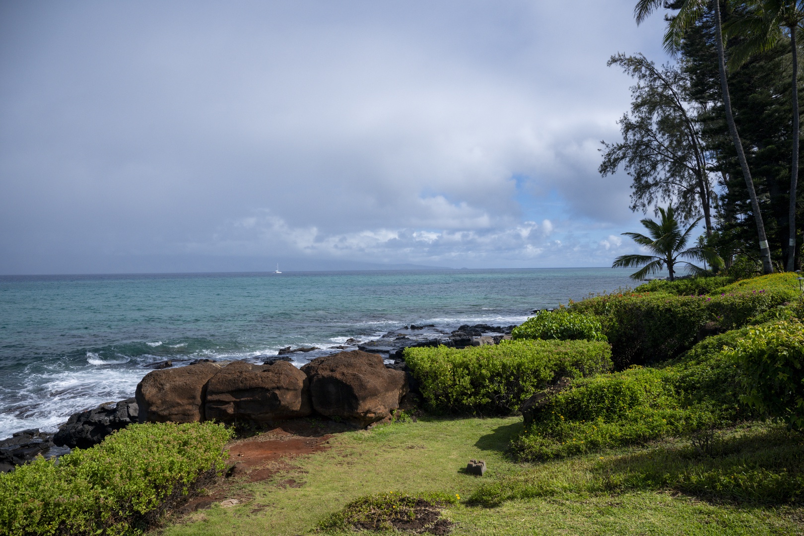 Lahaina Vacation Rentals, Polynesian Shores 114 - Follow the rocky coastline as it curves along the water past the property.