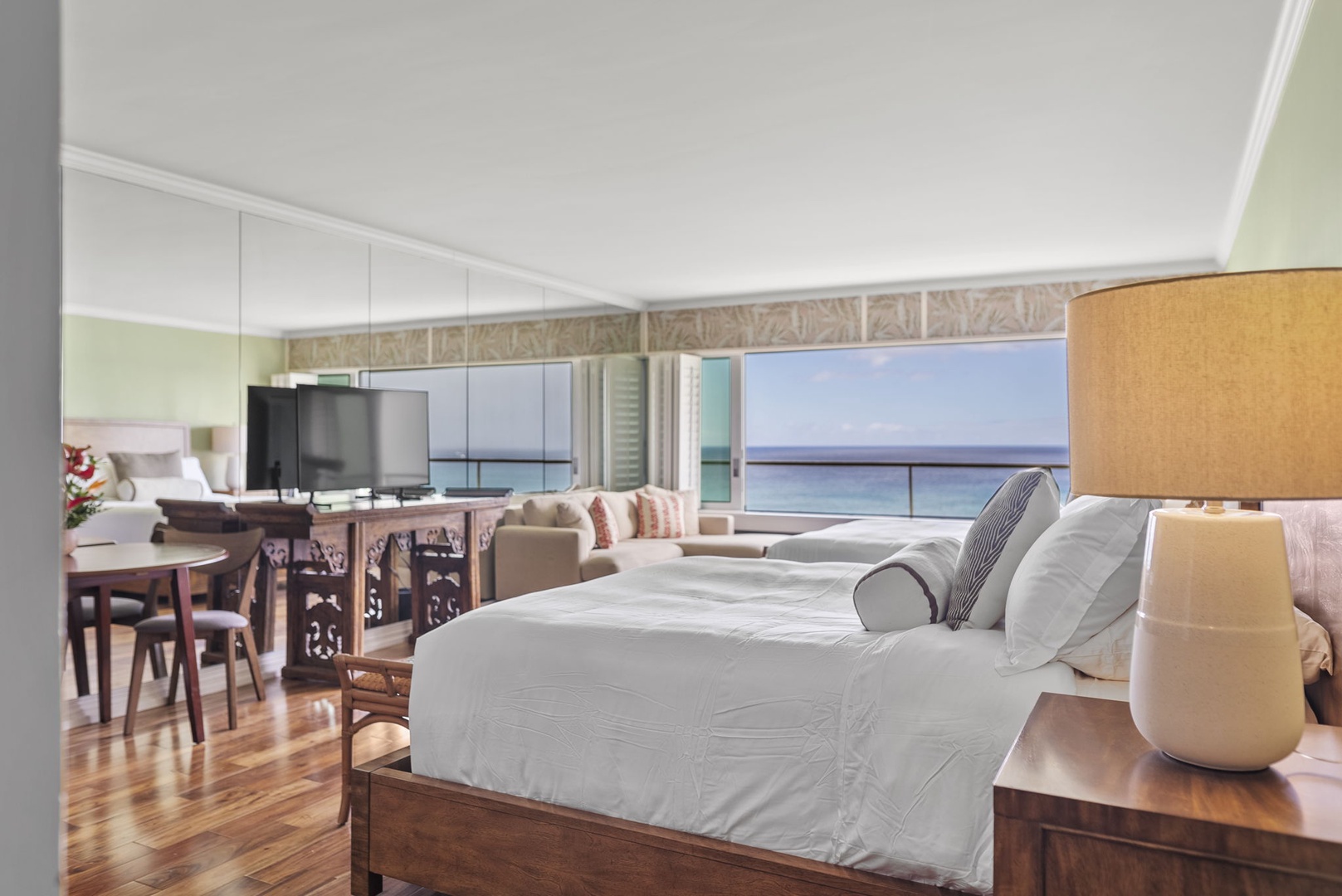 Honolulu Vacation Rentals, Colony Surf #1403 - Luxurious suite with panoramic ocean views, modern amenities, and spacious sleeping area—experience comfort and style by the sea.