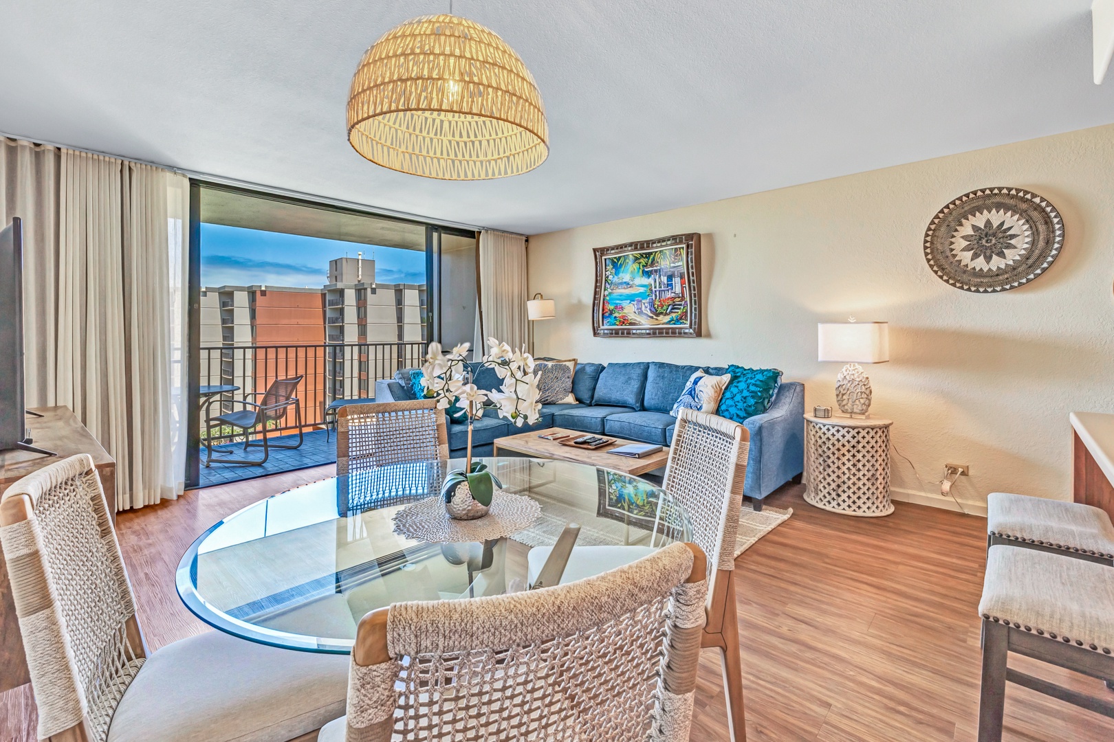 Lahaina Vacation Rentals, Kaanapali Shores 746 - At Kaanapali Shores 746, the cozy circular dining table and comfy couch create a perfect space to gather.
