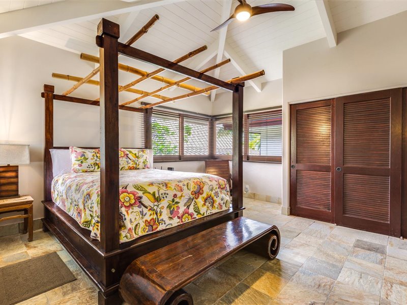 Kailua Kona Vacation Rentals, Blue Water - Guest bedroom with tropical touches and vaulted ceiling