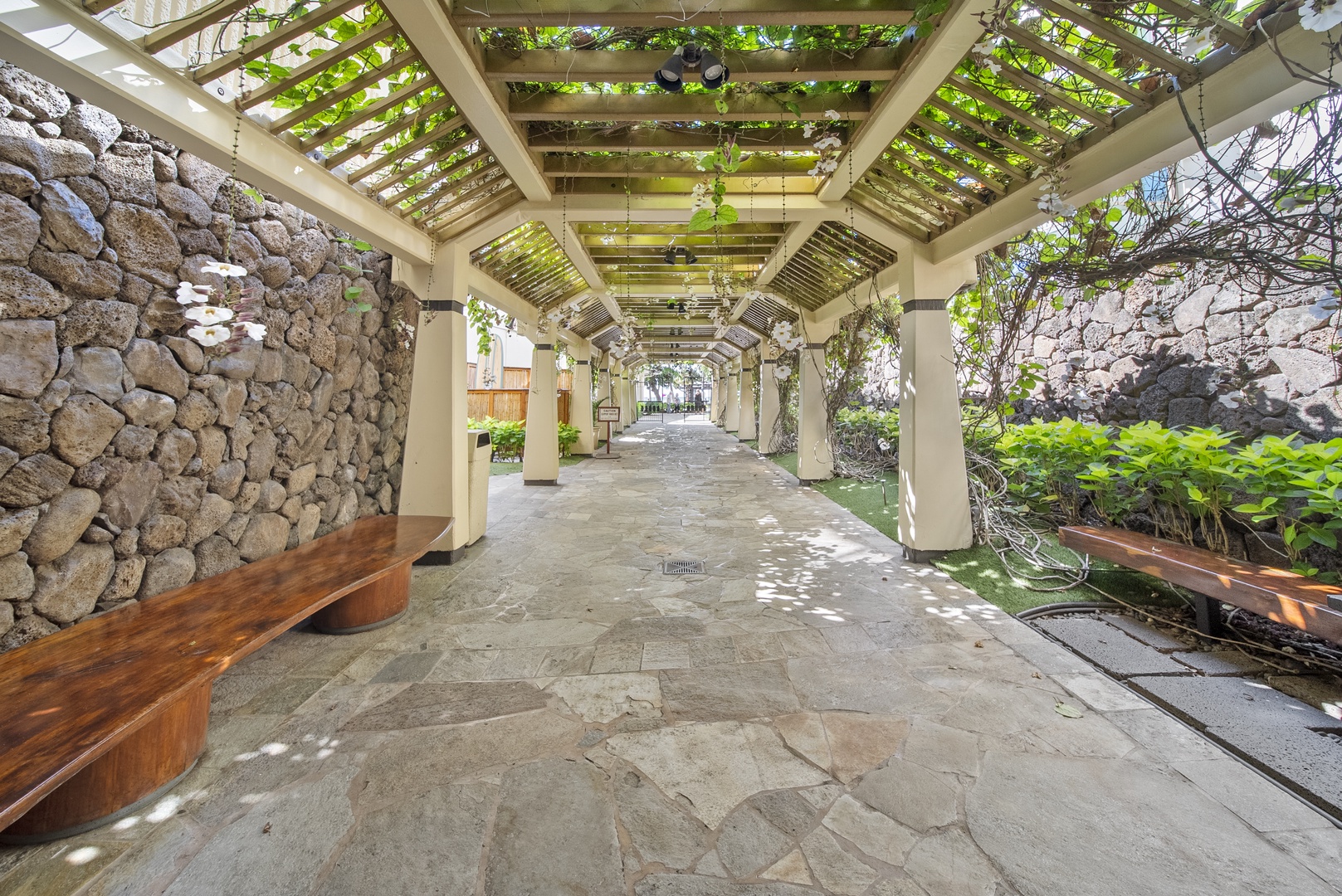 Honolulu Vacation Rentals, Aston Waikiki Beach Tower 602 - Wander through beautifully landscaped pathways that lead to tropical retreats.