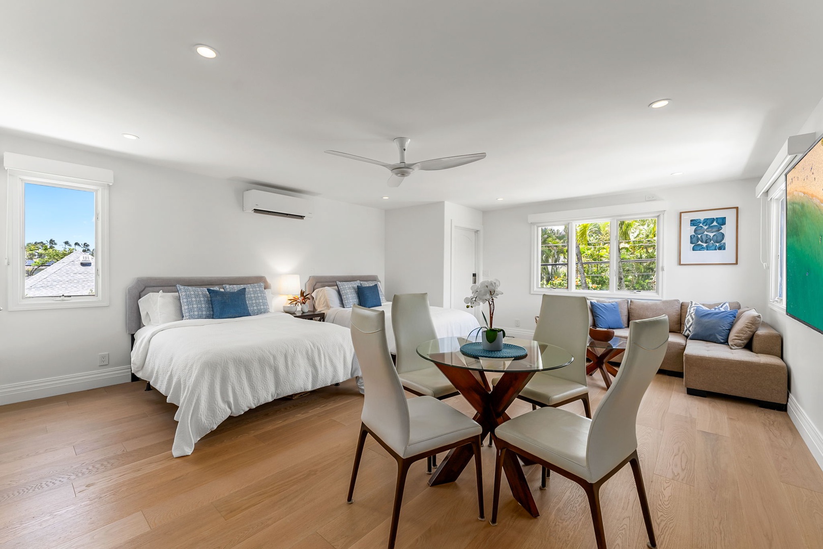 Kailua Vacation Rentals, Lanikai Sunrise Estate - Spacious studio suite featuring two queen beds, a dining table, and open layout ideal for multigenerational travel with an optional private entrance.