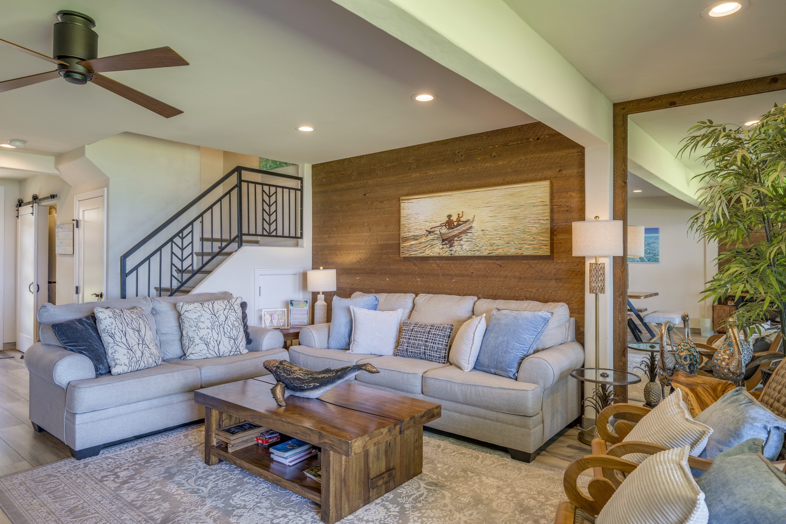 Lahaina Vacation Rentals, Puamana 240-3 - Spacious and cozy living room with plush seating, ideal for relaxing with loved ones.