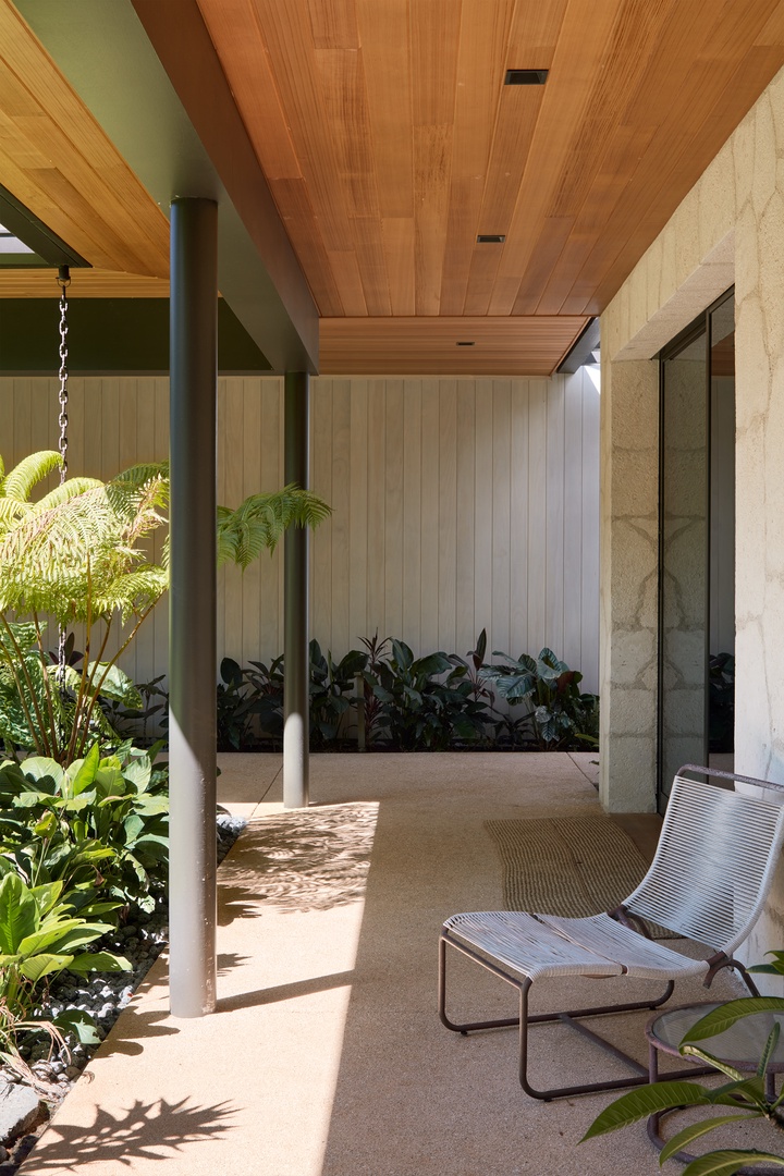Honolulu Vacation Rentals, Diamond Head Hillside Estate** - Natural textures, tropical greenery, and contemporary architecture come together to create a welcoming outdoor space that feels both private and serene.