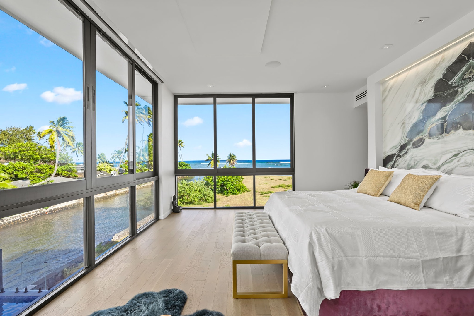 Honolulu Vacation Rentals, Ocean Villa Emilie - Floor-to-ceiling glass panels offer an immersive connection to the landscape from the comfort of your bed.