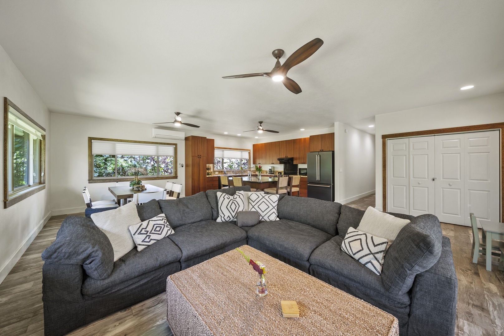 Haleiwa Vacation Rentals, Kaunala Retreat - Spacious open-concept living room with sectional seating—perfect for unwinding after a North Shore day.