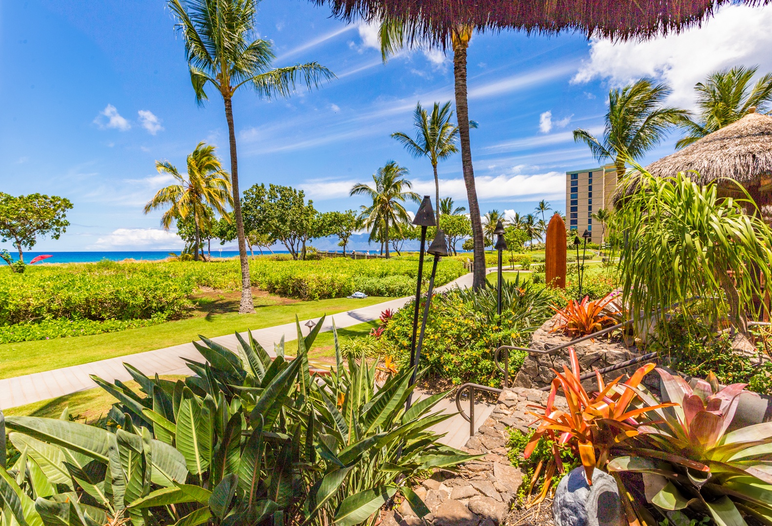 Lahaina Vacation Rentals, Honua Kai Konea 230/232 - Follow the palm-lined paths that wind toward the shoreline and ocean views