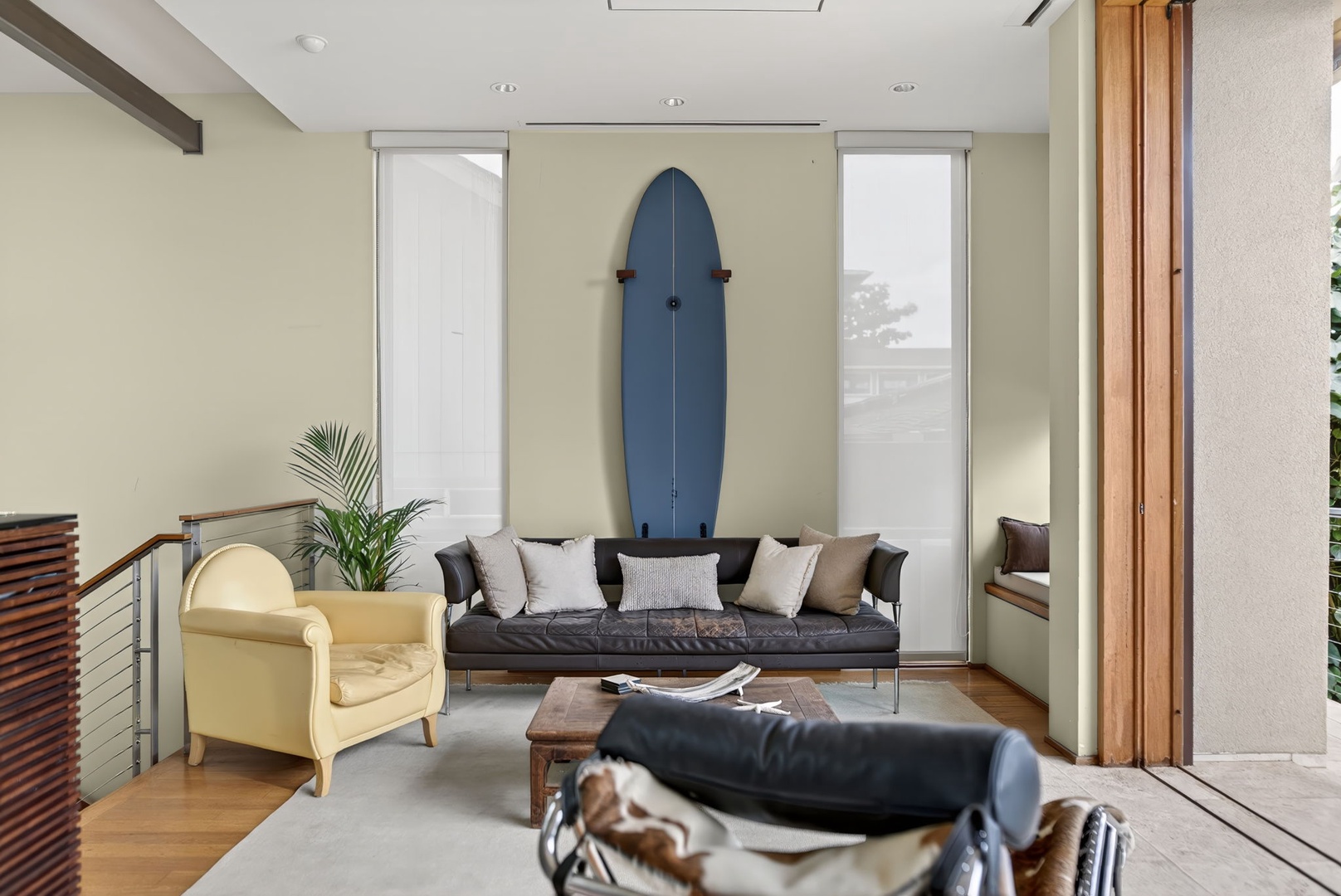 Haleiwa Vacation Rentals, HaleGator - Relax in the bright open-concept living space, where floor-to-ceiling glass doors invite in ocean breezes and abundant natural light.