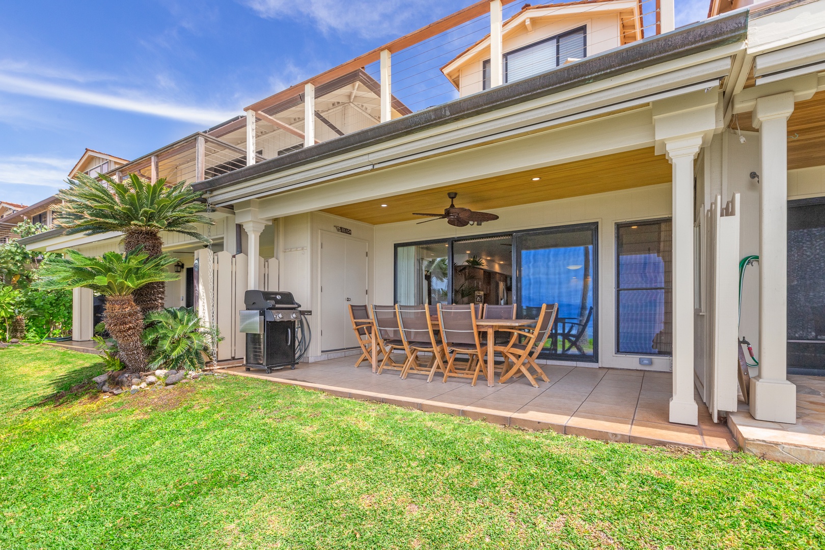 Lahaina Vacation Rentals, Puamana 254-2 - Gather and enjoy al-fresco dining on the downstair lanai with outdoor furniture for eight.