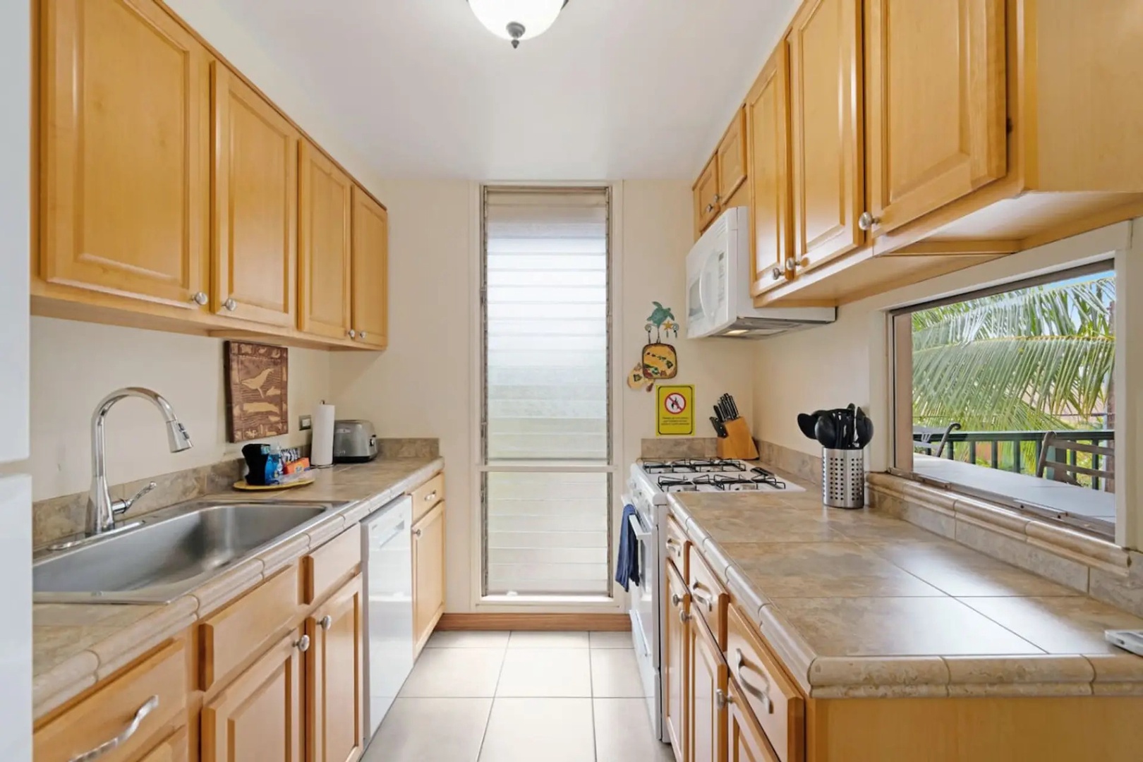 Kihei Vacation Rentals, Kalama Terrace P302 - Real meals get made here, knife block and dishwasher both close at hand.