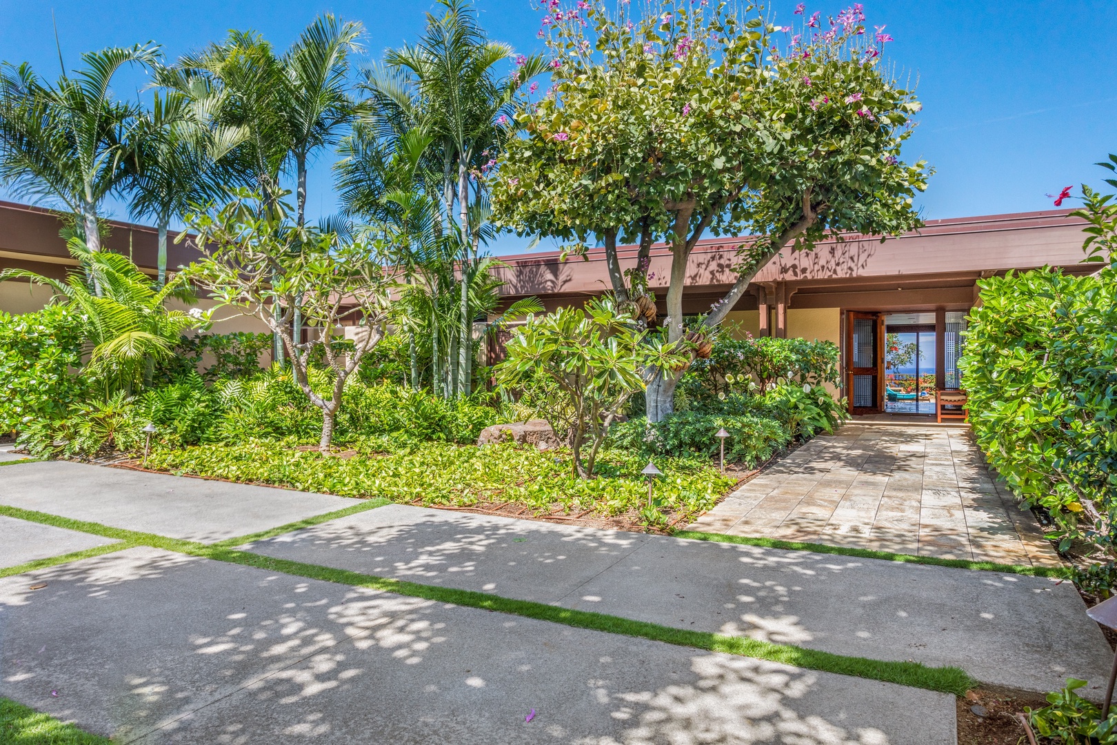 Kamuela Vacation Rentals, 4BD Villas (21) at Mauna Kea Resort - Inside the Gated Exterior Entrance w/Tropical Landscaping.