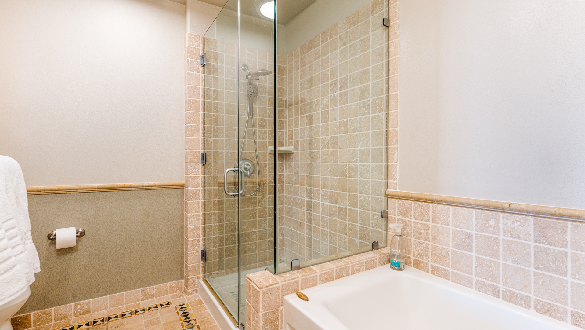 Kapolei Vacation Rentals, Kai Lani 24B - The primary guest bathroom with a shower and soaking tub.