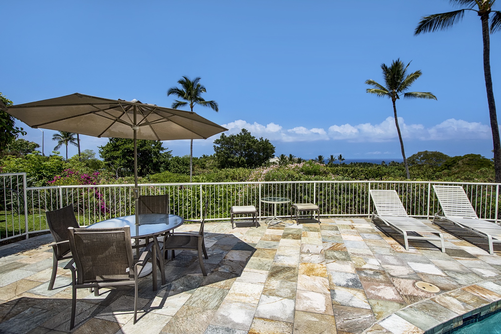 Kailua Kona Vacation Rentals, Keauhou Akahi 302 - Pool Area with tables and chairs and Ocean view, of course