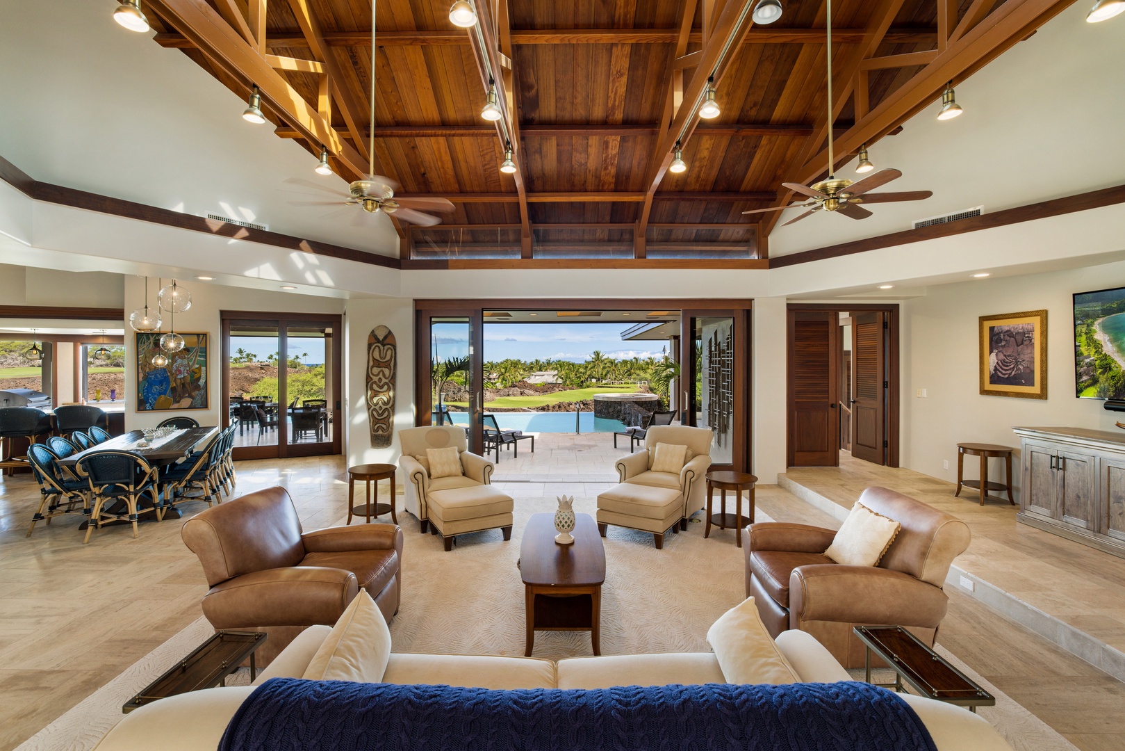 Kamuela Vacation Rentals, Champion Ridge 7 - Vaulted ceilings and sliding glass walls create seamless indoor-outdoor flow in the expansive great room.