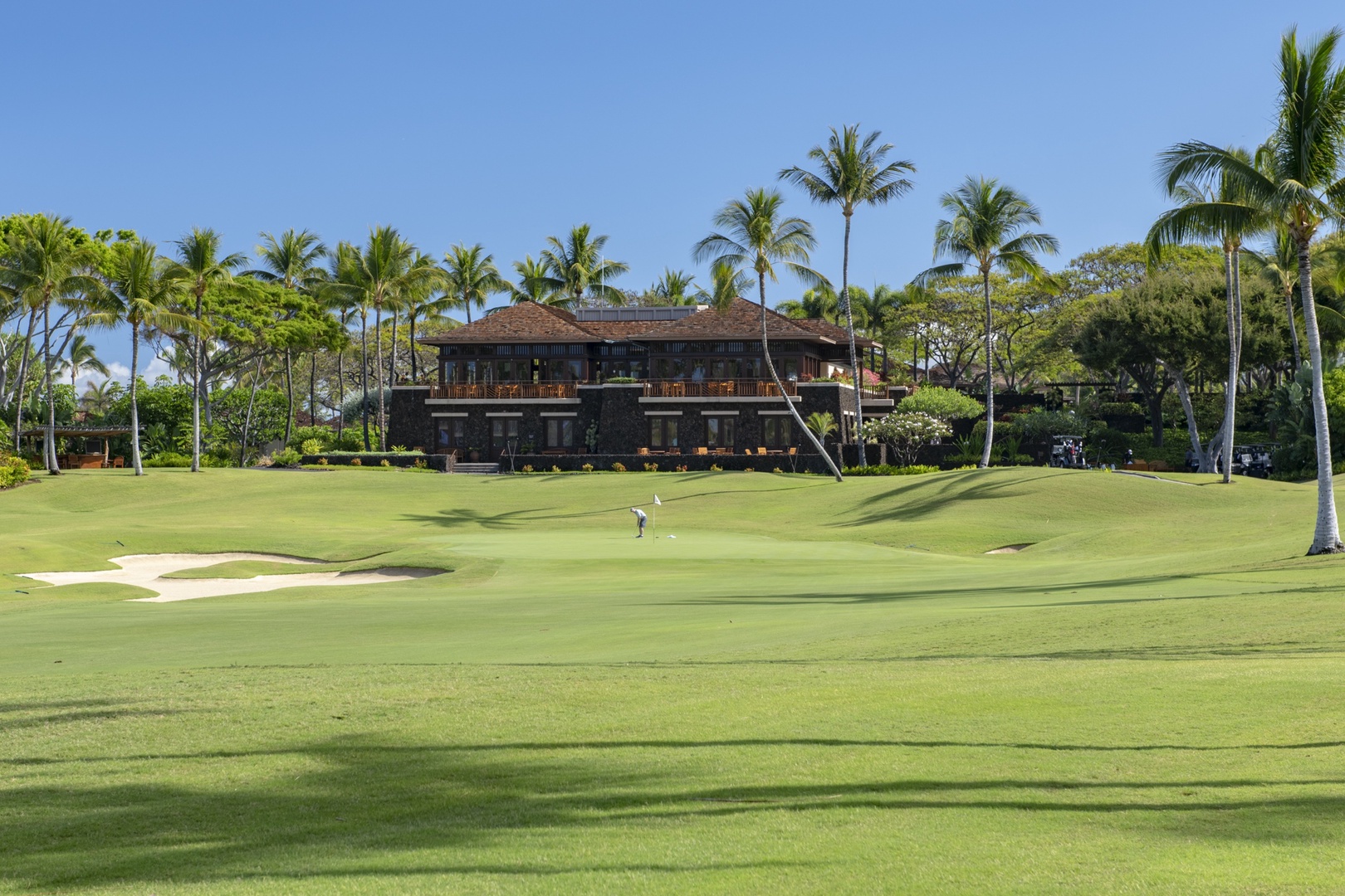 Kailua Kona Vacation Rentals, 3BD Golf Villa (3101) at Hualalai Resort - View looking from from in front of the villa towards the green of the 18th, the resort pro shop and one of the resort restaurants.