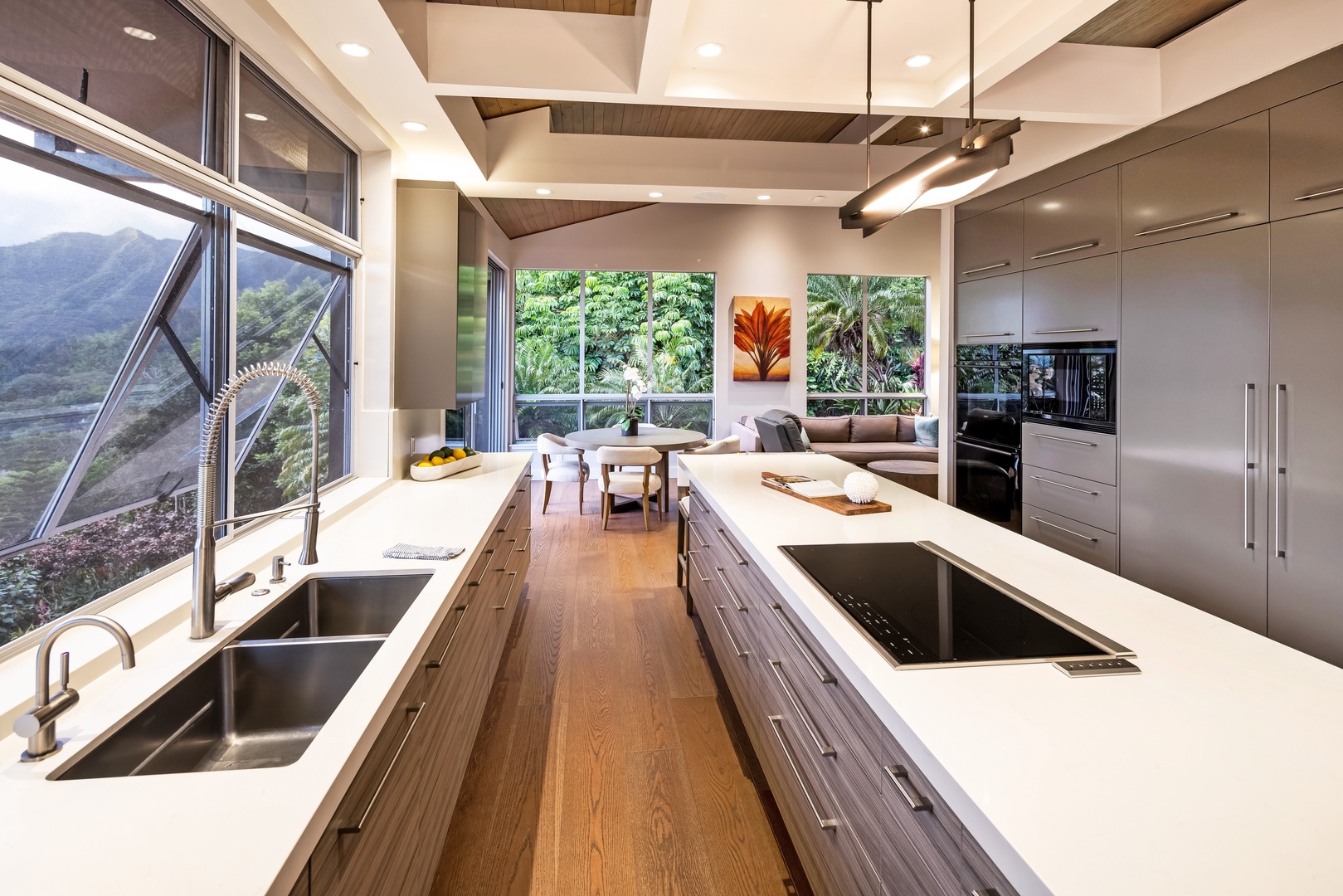Honolulu Vacation Rentals, Manoa Royal Retreat - Custom-designed kitchen with dual sinks and panoramic views—perfect for group meals or private chefs.
