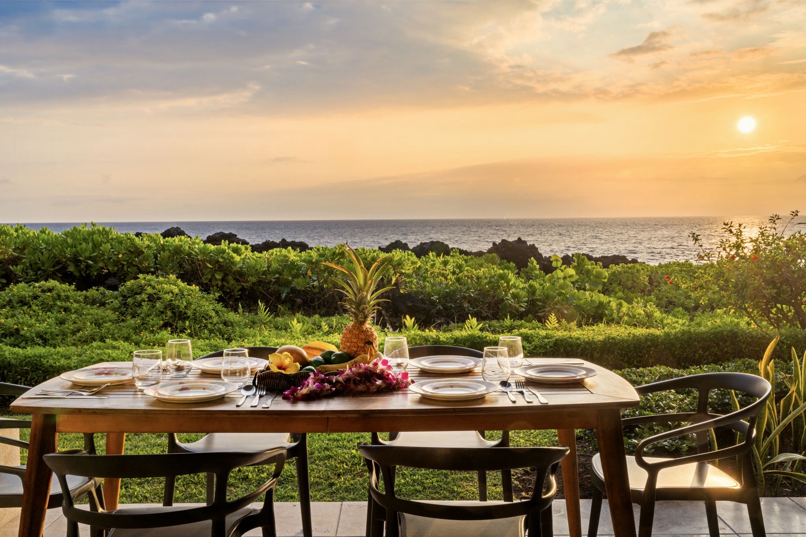 Kailua Kona Vacation Rentals, Keauhou Kona Surf & Racquet 1104 - Up close, the outdoor table seats the group with the shoreline for a backdrop.
