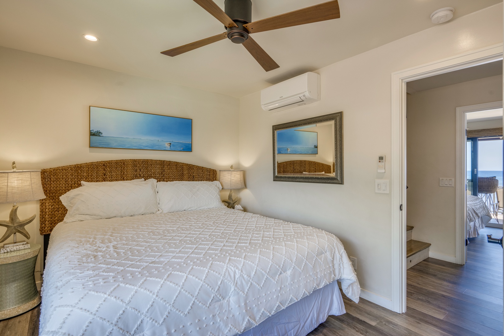 Lahaina Vacation Rentals, Puamana 240-3 - A cozy retreat featuring a plush queen size bed and elegant island-inspired décor.
