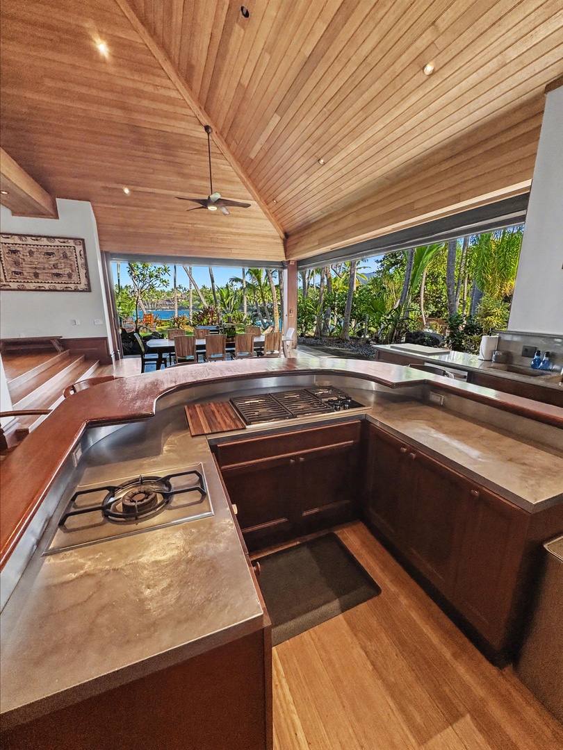 Kailua-Kona Vacation Rentals, Hahalua Bay Villa - Your gourmet kitchen opens to tropical views, where cooking becomes pure joy with premium appliances and natural light streaming in.