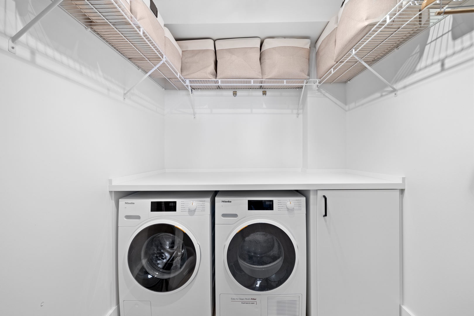 Honolulu Vacation Rentals, Hale Pono Waikiki - Keep your vacation wardrobe fresh with this convenient and well-equipped laundry area.