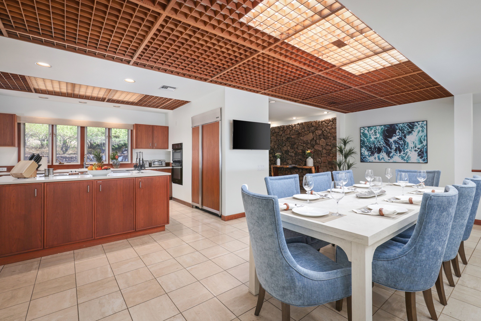 Kamuela Vacation Rentals, 4BD Fairways South Estate (29) at Mauna Kea Resort - Wide view of the dining room into the kitchen featuring abundant natural light