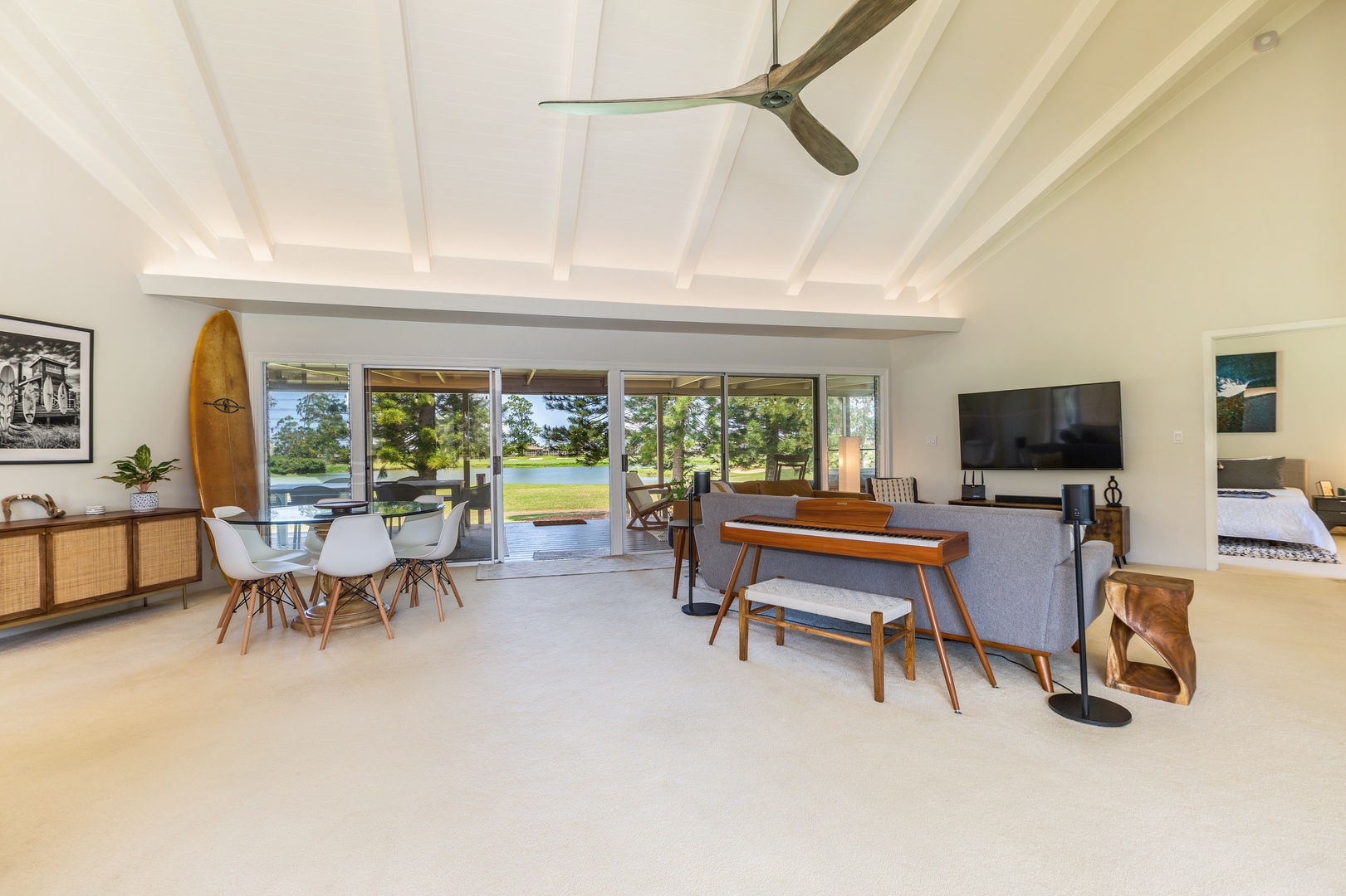 Princeville Vacation Rentals, Wai Puna - Expansive, comfortable living area with views through the sliding glass doors