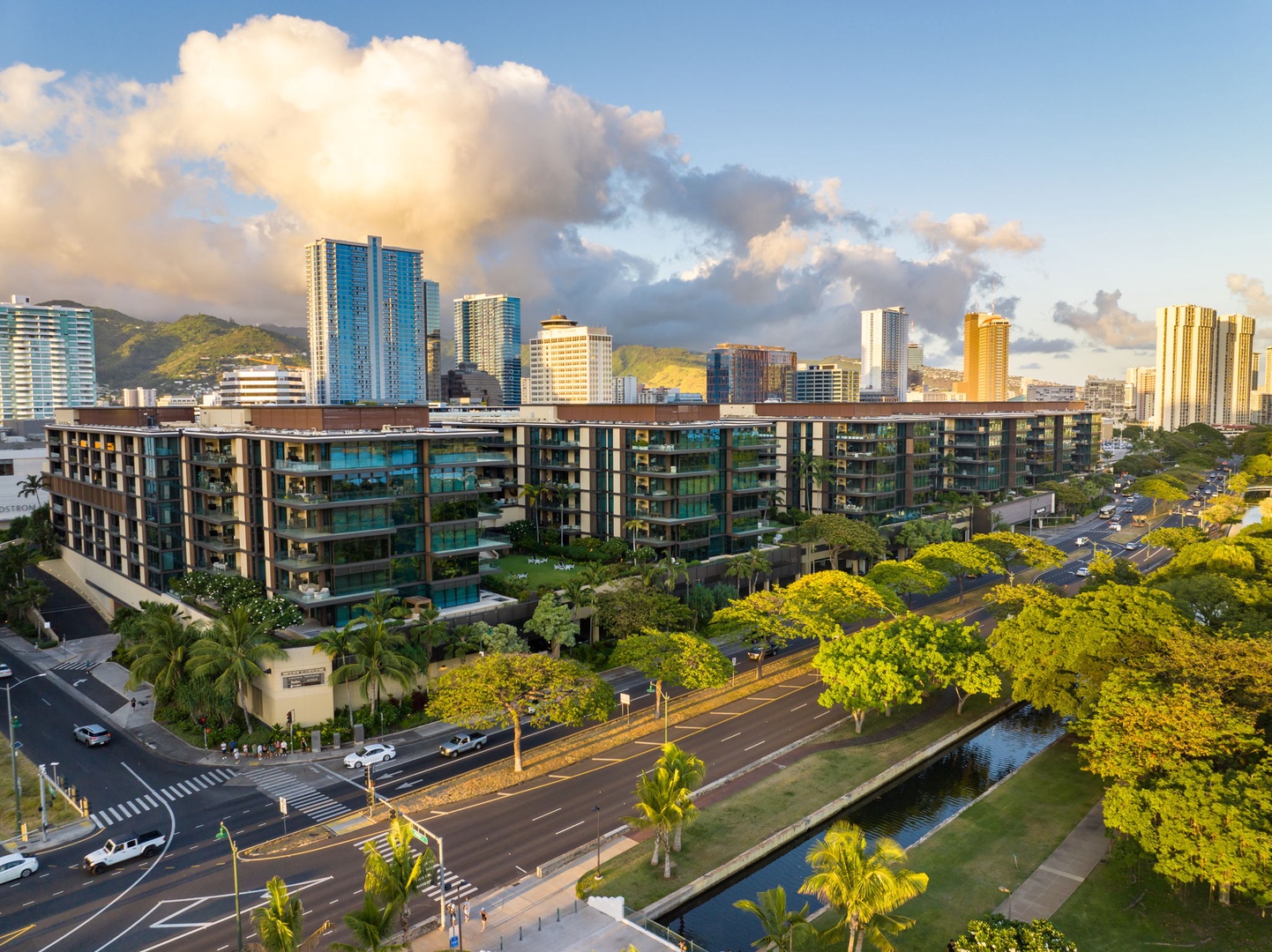 Honolulu Vacation Rentals, Park Lane Getaway - Golden hour view of Park Lane, blending urban luxury with tropical charm.