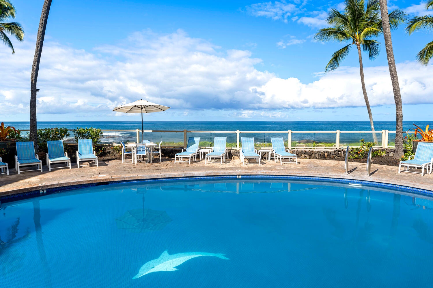 Kailua-Kona Vacation Rentals, Kona Reef B32 - Relax on the chaise loungers poolside.