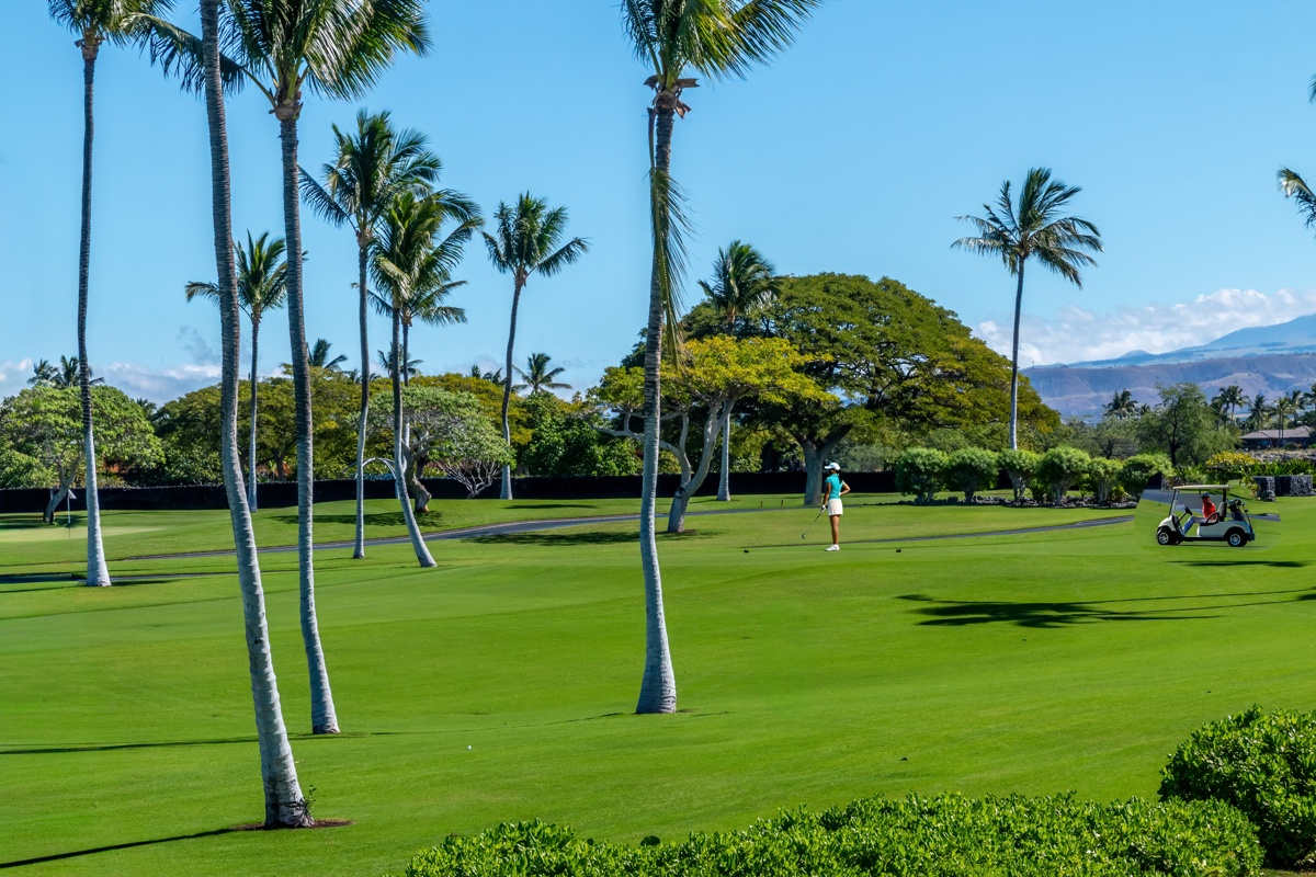 Kailua Kona Vacation Rentals, Fairways Villa 120A - Beautiful golf course with swaying palm trees and mountain backdrop creates a tropical paradise setting for your stay.