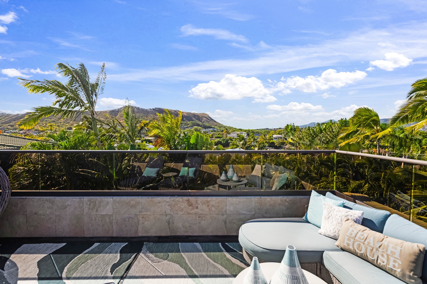 Honolulu Vacation Rentals, Pili Pono - Rooftop deck with Diamond Head views and cozy seating.