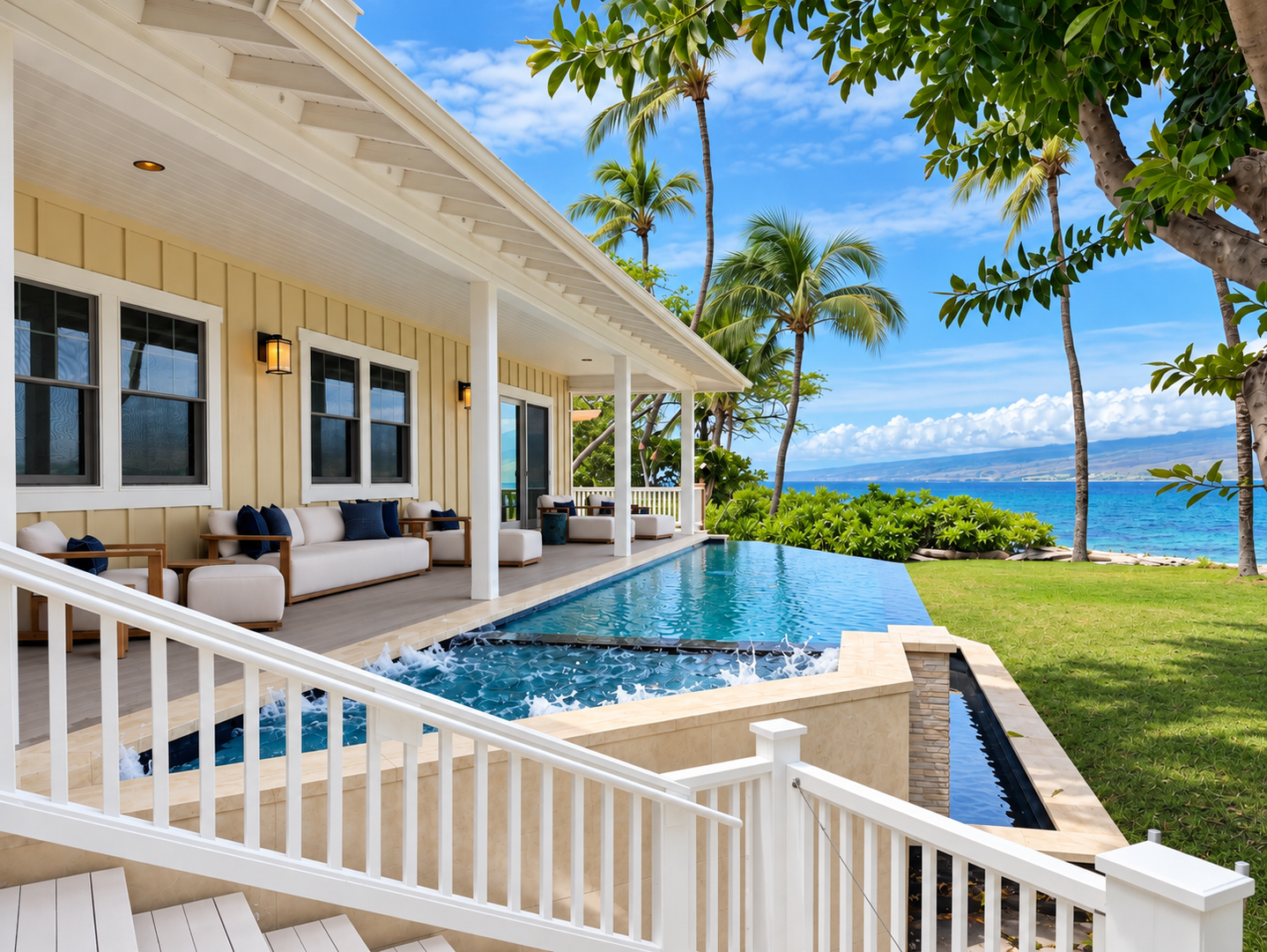 Kamuela Vacation Rentals, 4BD Estate Home at Puako Bay (74) - Alongside the house, the pool's edge lines up with the horizon and the water past the lawn.