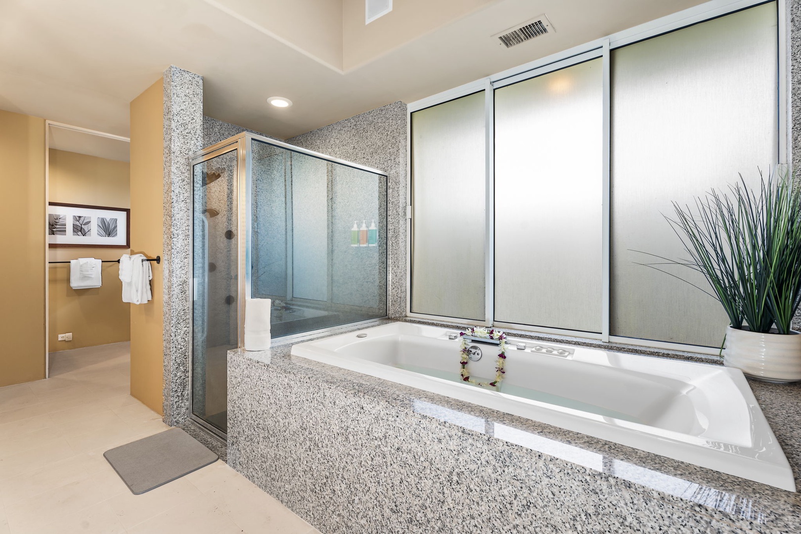 Kailua Kona Vacation Rentals, Hale Nai'a - Indulge in your private spa-like bathroom featuring a deep jetted soaking tub and spacious glass shower for ultimate relaxation.