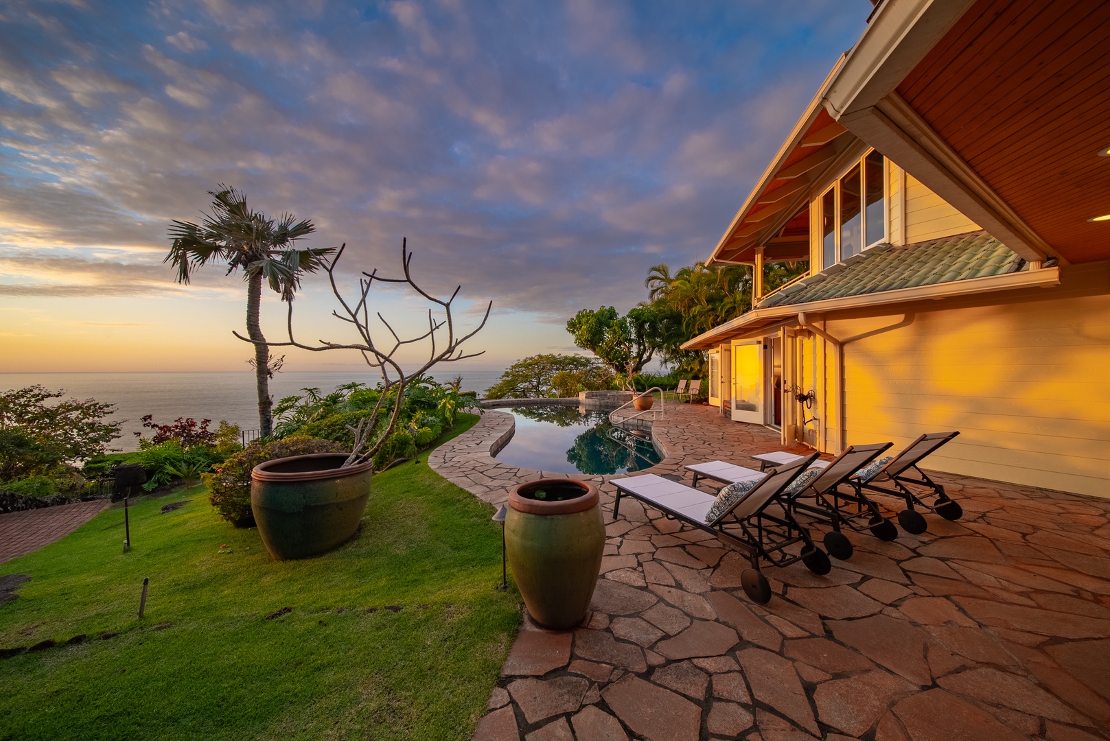 Haleiwa Vacation Rentals, Ka Hale Hau'oli - Stunning ocean view villa featuring infinity pool, tropical gardens, and breathtaking sunset views over the Pacific horizon.