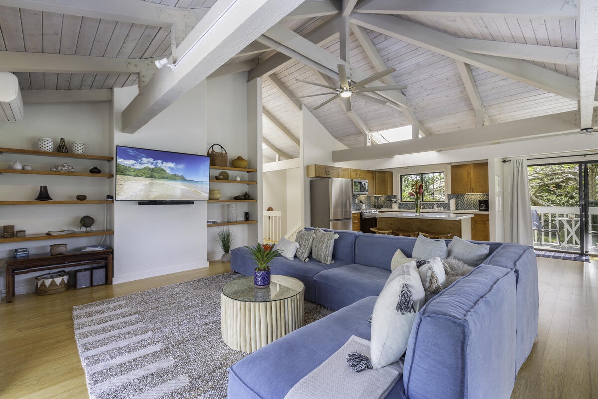 Princeville Vacation Rentals, Hale Kalani - As you step into the spacious open-concept living area, you're greeted by a warm island ambiance