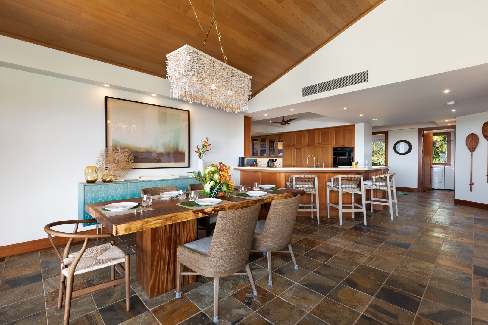 Kailua Kona Vacation Rentals, 3BD Waiulu Villa 111D at Hualalai Resort - Stunning dining area with a table seating six, opening to breathtaking outdoor views.