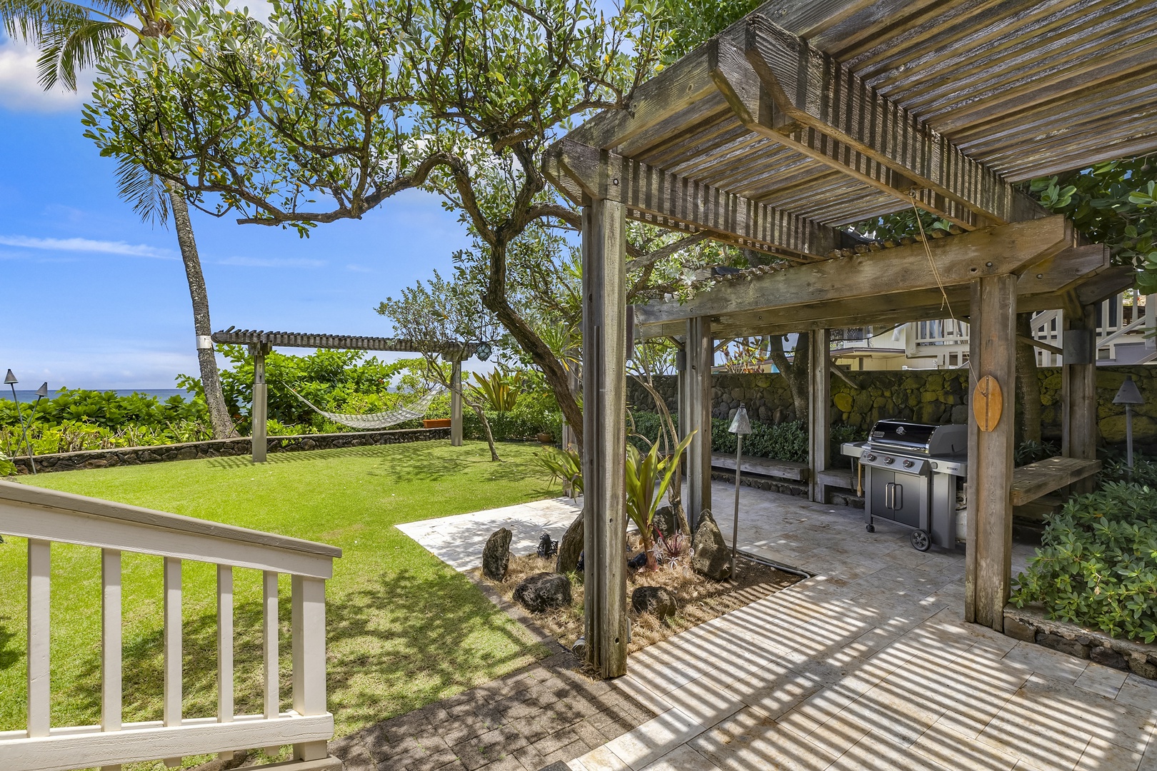 Haleiwa Vacation Rentals, Hale Kimo - The covered BBQ area has an amazing view.