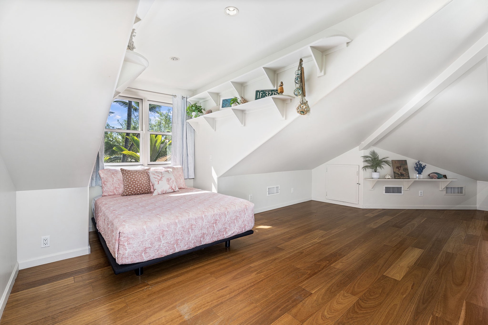 Kailua-Kona Vacation Rentals, Hahalua Bay Villa - Drift off peacefully in your charming attic bedroom where warm hardwood floors meet built-in storage beneath the eaves.