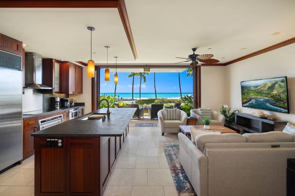 Kapolei Vacation Rentals, Ko Olina Beach Villas B109 - Tall ceilings and open concept design blends living, dining and kitchen areas.