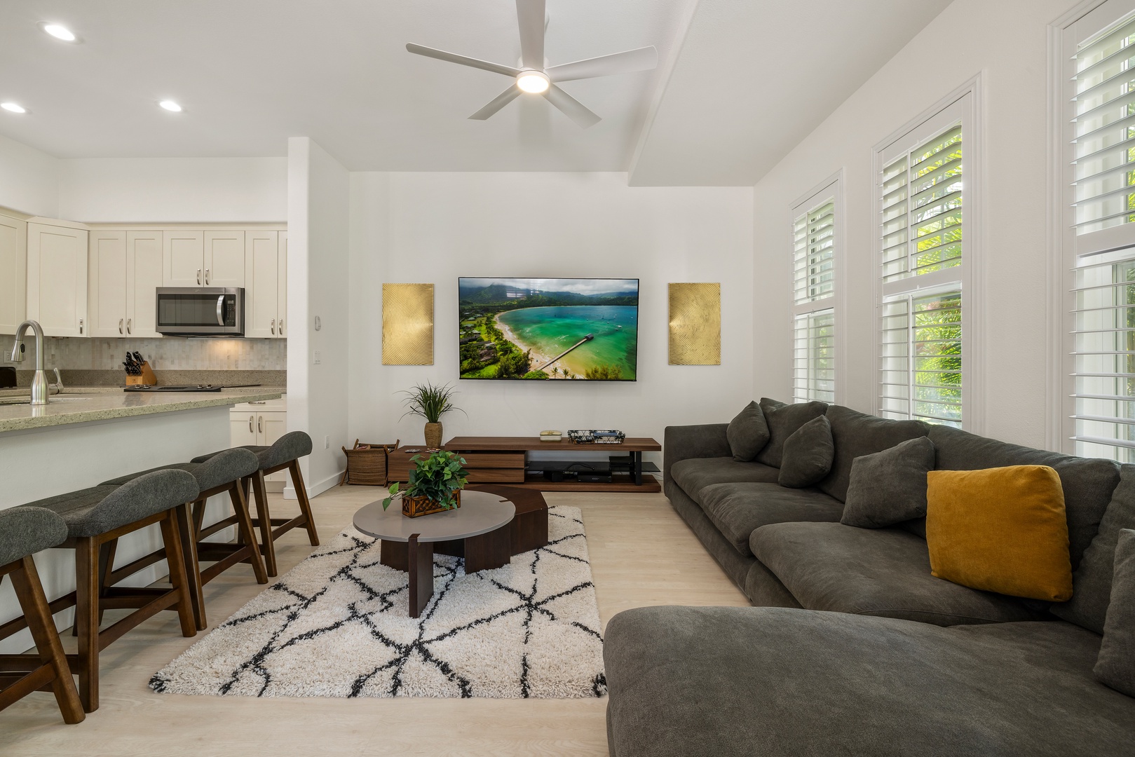 Kapolei Vacation Rentals, Coconut Plantation 1078-3 - Alternate view of the cozy living area with cozy sofa, stylish decor and a large TV, perfect for movie nights.