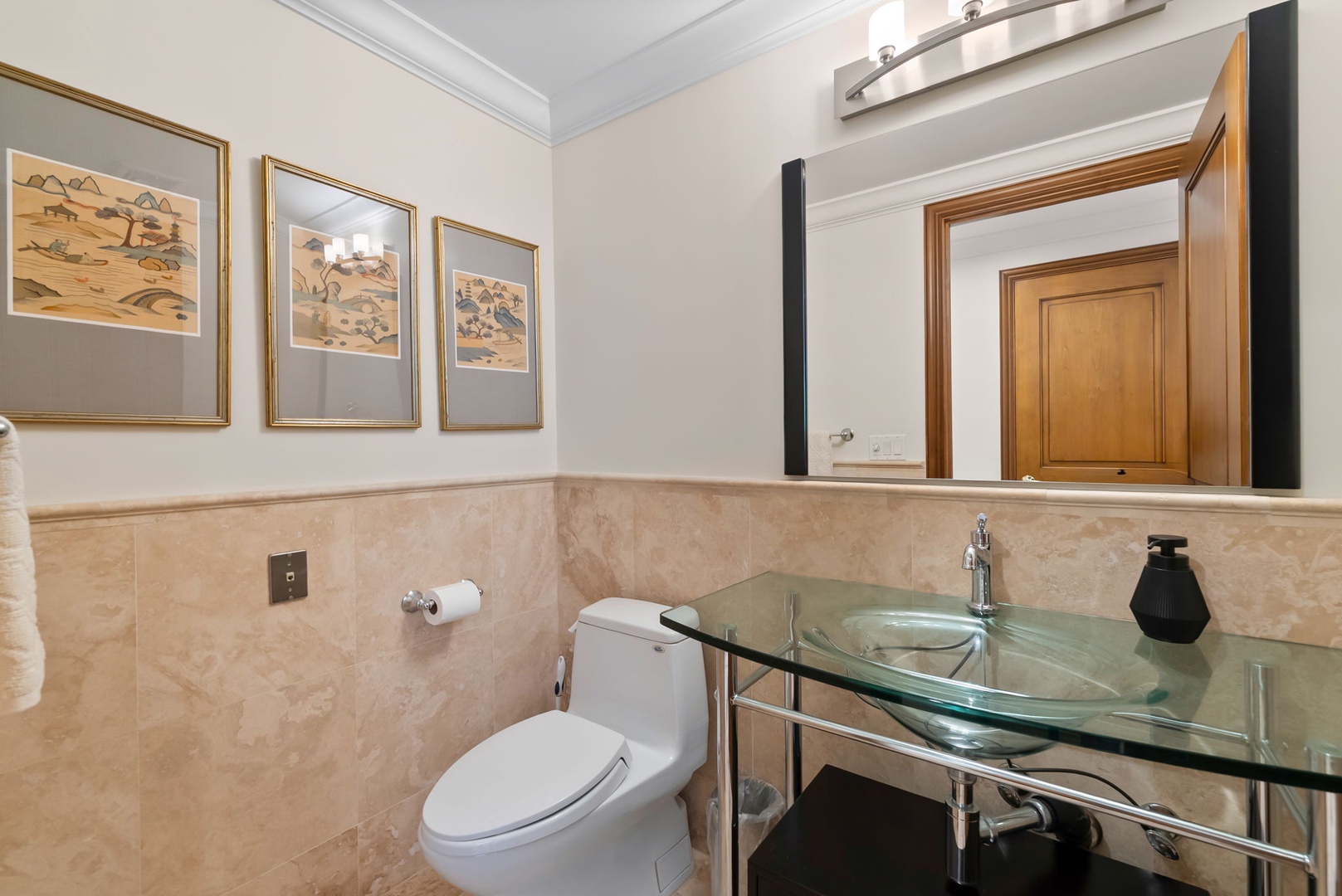 Honolulu Vacation Rentals, Maunalua Estate - Warm stone finishes and thoughtful details bring a polished, spa-like feel to the bathroom.