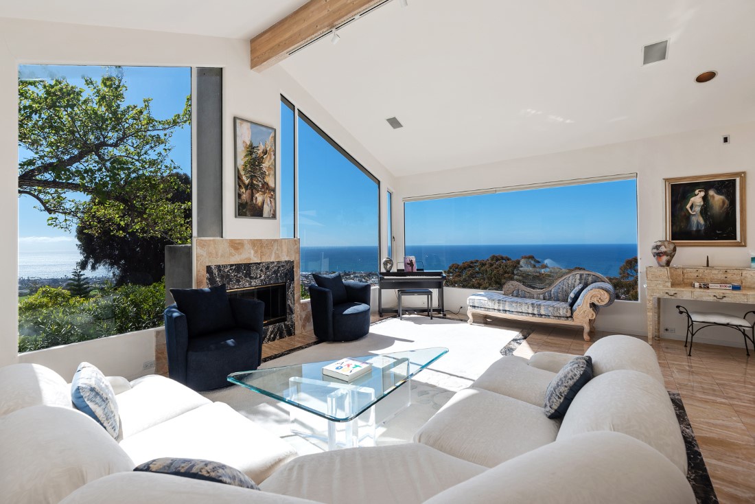 La Jolla Vacation Rentals, Sunset Villa I - The Living Room features panoramic views of the Pacific Ocean perfect for fireplace and sunset conversations