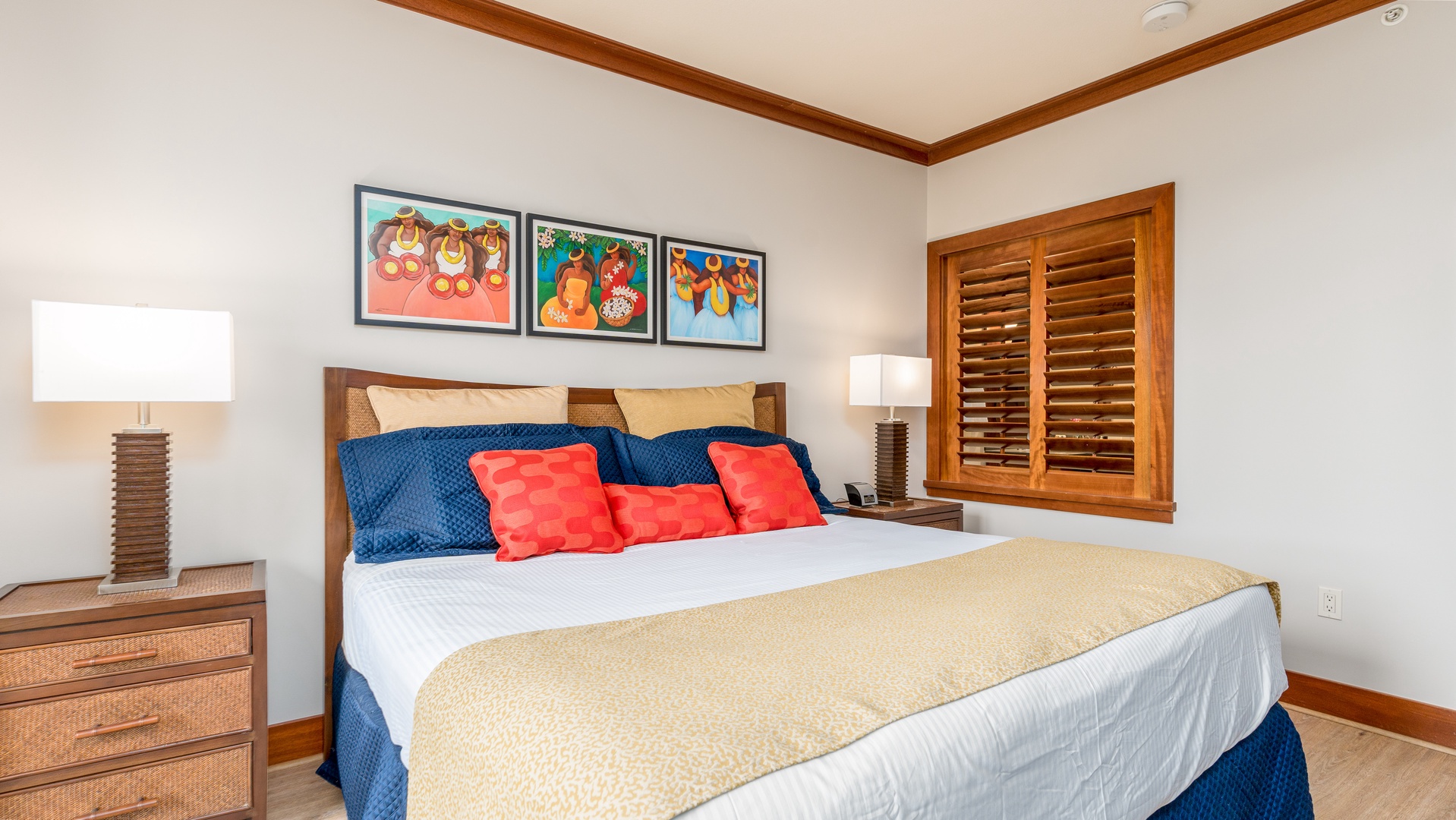 Kapolei Vacation Rentals, Ko Olina Beach Villas O305 - The primary guest bedroom with bold prints and soft linens.